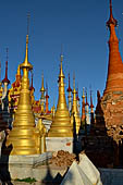 Inle Lake Myanmar. Indein, on the summit of a hill the  Shwe Inn Thein Paya a cluster of hundreds of ancient stupas. Many of them are ruined and overgrown with bushes. 